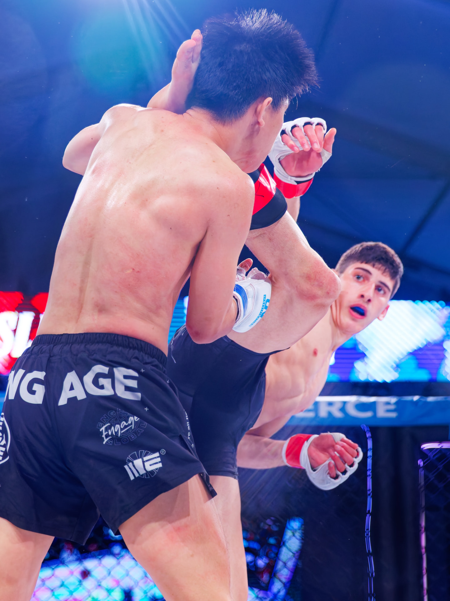 Asher Tessler competing in the MMA cage